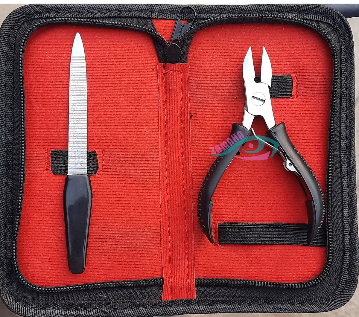 Black-Grip-toenail-clipper-with-black-nail-file-in-packing-Copy.jpg